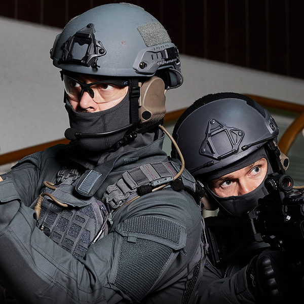 Law enforcement personnel at a door