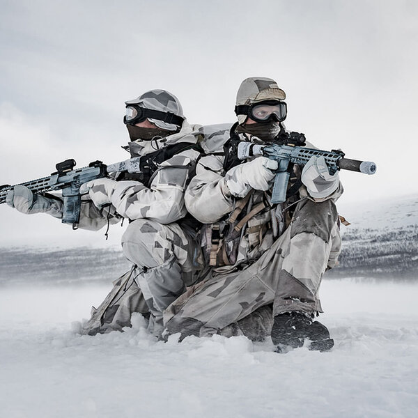 Soldier wearing snow camouflage clothing